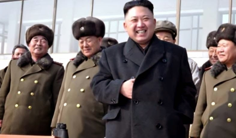 main cachée. Kim Jong Un2